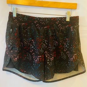 Avia woman’s multi colored activewear lined nylon shorts in a size small.